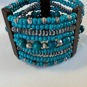 5 for $25 sale!!  Turquoise, silver, and wood beaded bracelet